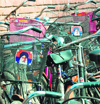 Cycles bearing the photograph of Chief Minister Parkash Singh Badal in the parking lot of Government Girls Senior Secondary School in Amritsar.
