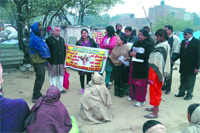 Members of the Inner Wheel Club address the public during the voter awareness drive in Bathinda on Sunday