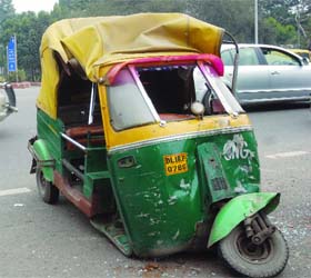 An auto was on Sunday hit by an unidentified Santro car in front of the National Stadium near the India Gate