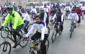 People participate in Yamuna Cyclothon in New Delhi on Sunday