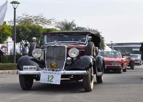 Vintage cars take part in a rally, organised by IREO City Classics Tour in Sector 61 at Gurgaon