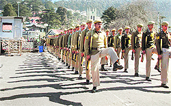Seema Sashastra Bal personnel take part in a march past at a Republic Day parade rehearsal in Shimla