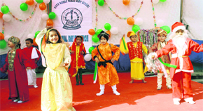 Children perform a dance during the annual day function of Guru Nanak Public High School in Jammu on Sunday. 