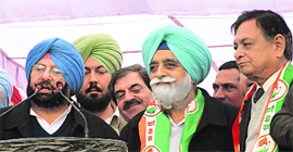 PPCC chief Capt Amarinder Singh addresses an election rally at Zirakpur on Sunday.