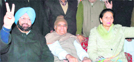 PCC chief Amarinder Singh along with his wife Preneet Kaur, Minister of State for External Affairs, at an election rally in Patiala on Sunday.