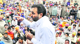 Satirist-turned-politician and People's Party of Punjab candidate Bhagwant Mann addresses a gathering. 