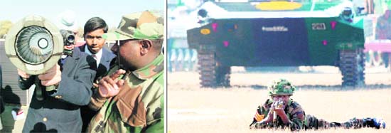 A school student gets tips on how to use a rocket launcher and (right) soldiers demonstrate combat drills during the Army mela at Khasa near Amritsar on Monday