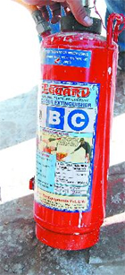 The fire extinguisher with the expiry date of 2006.
