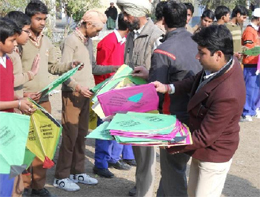 Members of the Noujawan Welfare Society distributed kites, with voter awareness messages written on them, among students of the MHRC Senior Secondary School in Bathinda recently. 