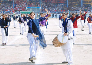 Students perform during the Republic Day rehearsal at the sports stadium in Bathinda on Monday. 