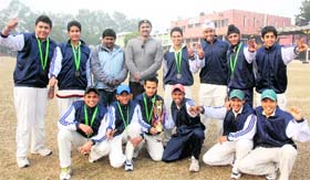 The U-16 cricket team with coach Dinesh Mongia at DAV College, Sector 10, Chandigarh