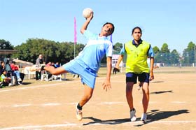 Players in action during the All-India Inter-University Handball Tournament at Panjab University, Chandigarh, on Monday