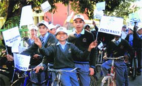 Students of DAV Senior Secondary School, Sector 8, take out a cycle rally on ‘save oil’ in Chandigarh on Monday
