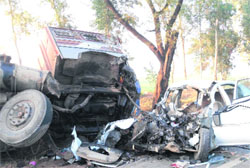 The mangled remains of a car and a truck after collision near Gillankhera in Fatehabad 