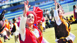 Schoolchildren perform a dance on the concluding day of the games in Ludhiana. 
