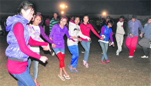 Athletes from Manipur perform during a campfire function in Ludhiana on Sunday. 