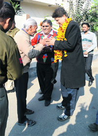 Ludhiana West BJP candidate Rajinder Bhandari seeks support from residents of Haibwal in Ludhiana. 