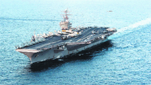A file photo shows a USS aircraft carrier in the Arabian Sea. The vessel passed through the Strait of Hormuz and is now in the Gulf.