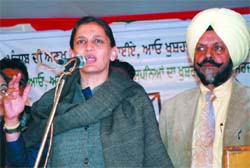 Veenu Badal, wife of Manpreet Badal, addresses an election rally in support of the PPP candidate from Bathinda (Urban) segment, Sukhdeep Singh Bhinder, at Partap Nagar on Tuesday.