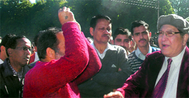 PU Vice-Chancellor RC Sobti (right) argues with employees outside the administrative block in Panjab University on Tuesday.