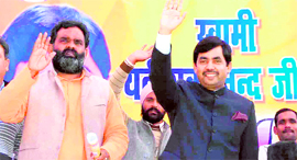 Former Minister for Civil Aviation Shahnawaz Hussain in Haridwar on Tuesday. Swami Yatishwarand is also seen in the picture.