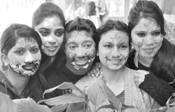 Girls sport painted faces during the Pyscho Fiesta at the MCMDAV College in Sector 36 of Chandigarh 