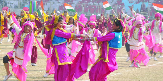 Students of Kamal Model Sr. Sec. School and Vandana International Sr. Sec. School perform at a cultural programme during the state-level Republic Day celebration in New Delhi on Wednesday. 