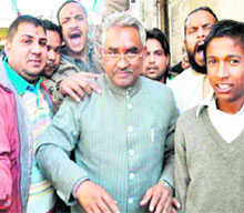 BJP candidate Madan Kaushik campaigns in Haridwar on Wednesday.