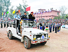 Chief Minister Prem Kumar Dhumal inspects a parade on the 42nd Statehood Day at Sundernagar on Tuesday