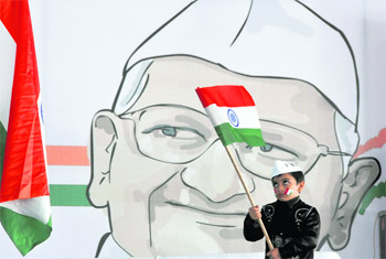 A child holds the Tricolour during a rally held by Anna Hazare’s supporters in Ludhiana.