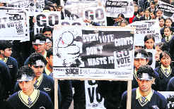 Students hold a rally on the National Voters Day in Hoshiarpur on Wednesday. A Tribune photograph