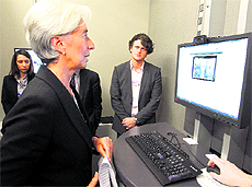 IMF managing director Christine Lagarde makes a webcast at the Facebook corner at the World Economic Forum in Davos, Switzerland on Friday