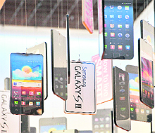 Images of the Galaxy SII smartphone at the Samsung Electronics headquarters in Seoul. The firm posted a record operating profit of US $4.72 billion in Q4, thanks largely to booming smartphone sales