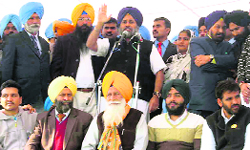Deputy Chief Minister Sukhbir Singh Badal addresses a rally in Mohali on Friday. 