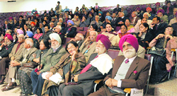 Panjab University alumni attend the meet at Panjab University in Chandigarh on Friday. 