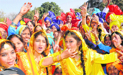 Girls and boys in a jubilant mood at the Republic Day function in Chandigarh on Thursday.