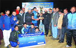 The BDM, Delhi, team with the 4th Girish Bhadri Memorial Cricket Tournament trophy in Dehradun on Thursday. 