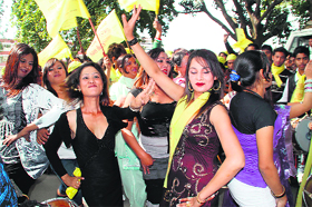 Eunuchs dance in support of Independent Rajni Rawat from the Raipur Assembly segment in Dehradun on Friday. 