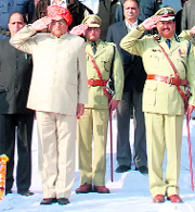 Chief Minister Bhupinder Singh Hooda takes the salute at an impressive march past in Panipat.