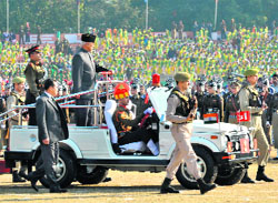Governor NN Vohra inspects the Republic Day parade at the MA Stadium in Jammu on Thursday. 