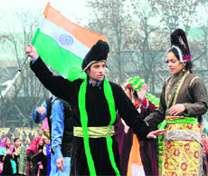 Students perform a dance during the Republic Day function at the Bakshi Stadium in Srinagar on Thursday. 