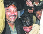 Relatives of deceased Maninder Singh wail in Jalandhar.