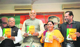 (From left) Kalraj Mishra, SP Shahi and Uma Bharti of the BJP release the manifesto in Lucknow on Friday