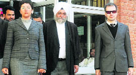 (Left) Olga Timoshi comes out of the High Court in Chandigarh on Friday. 