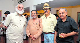 Paramjit Singh (extreme left) feels there’s a need to delve into the real role of galleries Right: Works of Paramjit Singh on display at an art gallery
