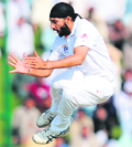 Englands Monty Panesar jumps in the air to celebrate the wicket of Misbah-ul-Haq in Abu Dhabi 