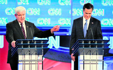 Republican presidential candidates Newt Gingrich (L) and Mitt Romney during a debate in Florida.  AFP