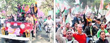 Godavari Thapliyal, Independent candidate from Mussoorie, campaigns on Saturday.; and (right) a road show being held in favour of the Congress candidate from the Rajpur Assembly segment in Dehradun