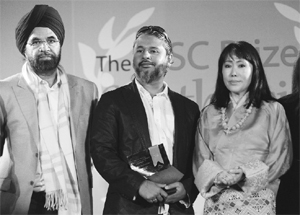 Sri Lankan writer Shehan Karunatilake  (middle) after receiving the 2012 DSC Prize for South Asian Literature