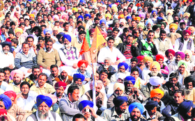 Villagers attend an SAD-BJP election rally on the last day of campaigning at Lambi on Saturday.